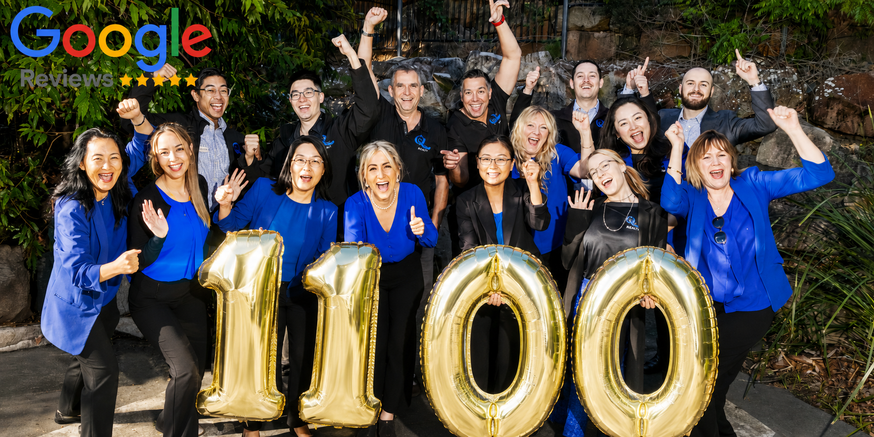 The Q Realty team celebrating more than 1,100 Google reviews